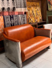  SOFA, INSPIRED BY AVIATOR CHAIRS , THIS ONE DISTINGUISHED BY ITS CONVENIENCE, GREY METAL AND HONEY LEATHER, 2 SEATER.    BOX 103. (L*W*H*) 145*85*80 cm.,1 pcs.